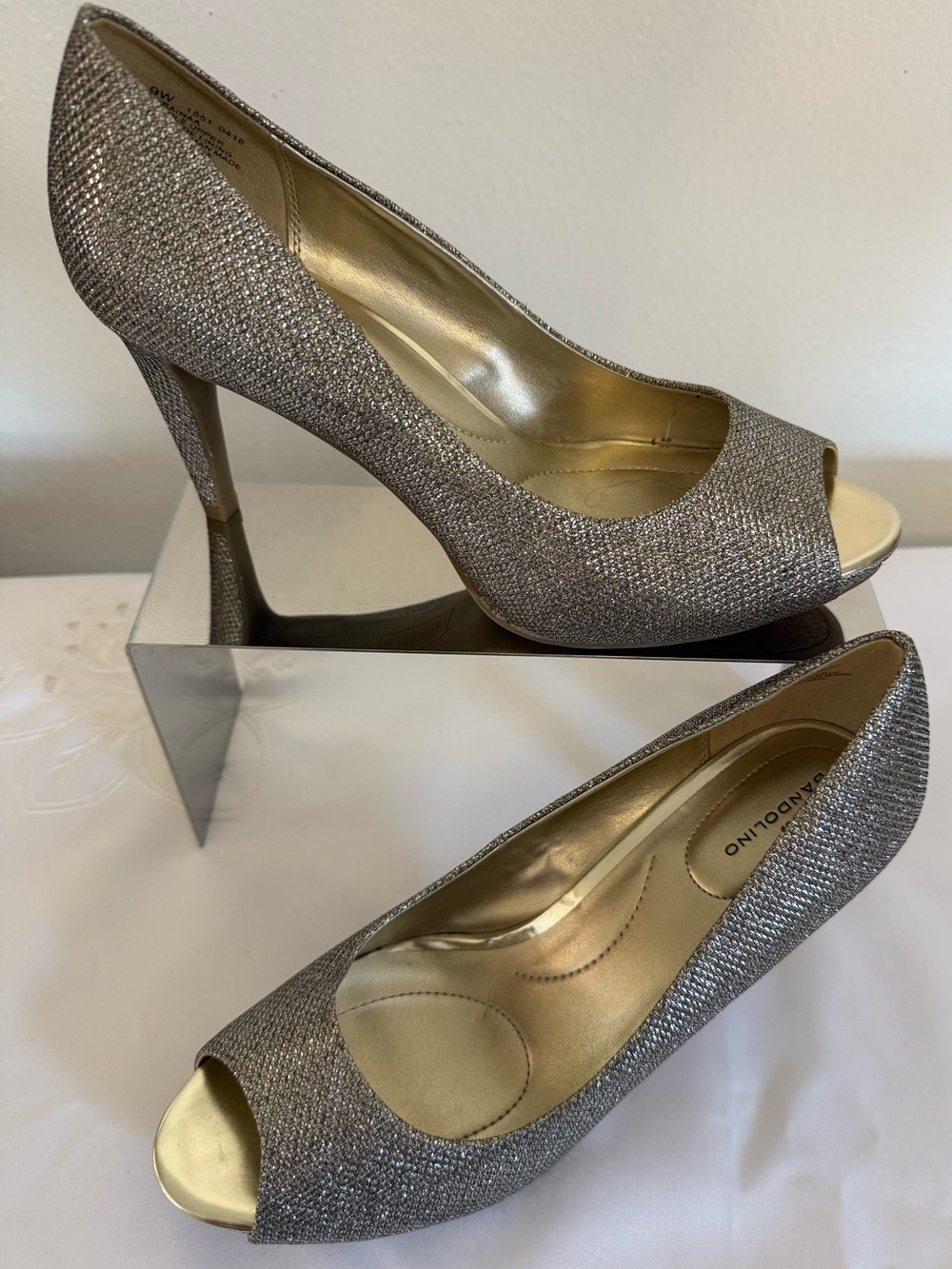 Bandolino Silver Glitter Peep-Toe Stiletto Heels, available in size 9 wide.